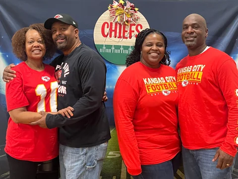 People smiling together at a Cleveland Avenue church family activity