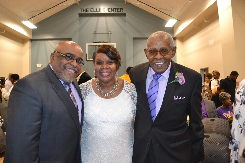 Three people together at a Cleveland Avenue gathering in the Ellis Center